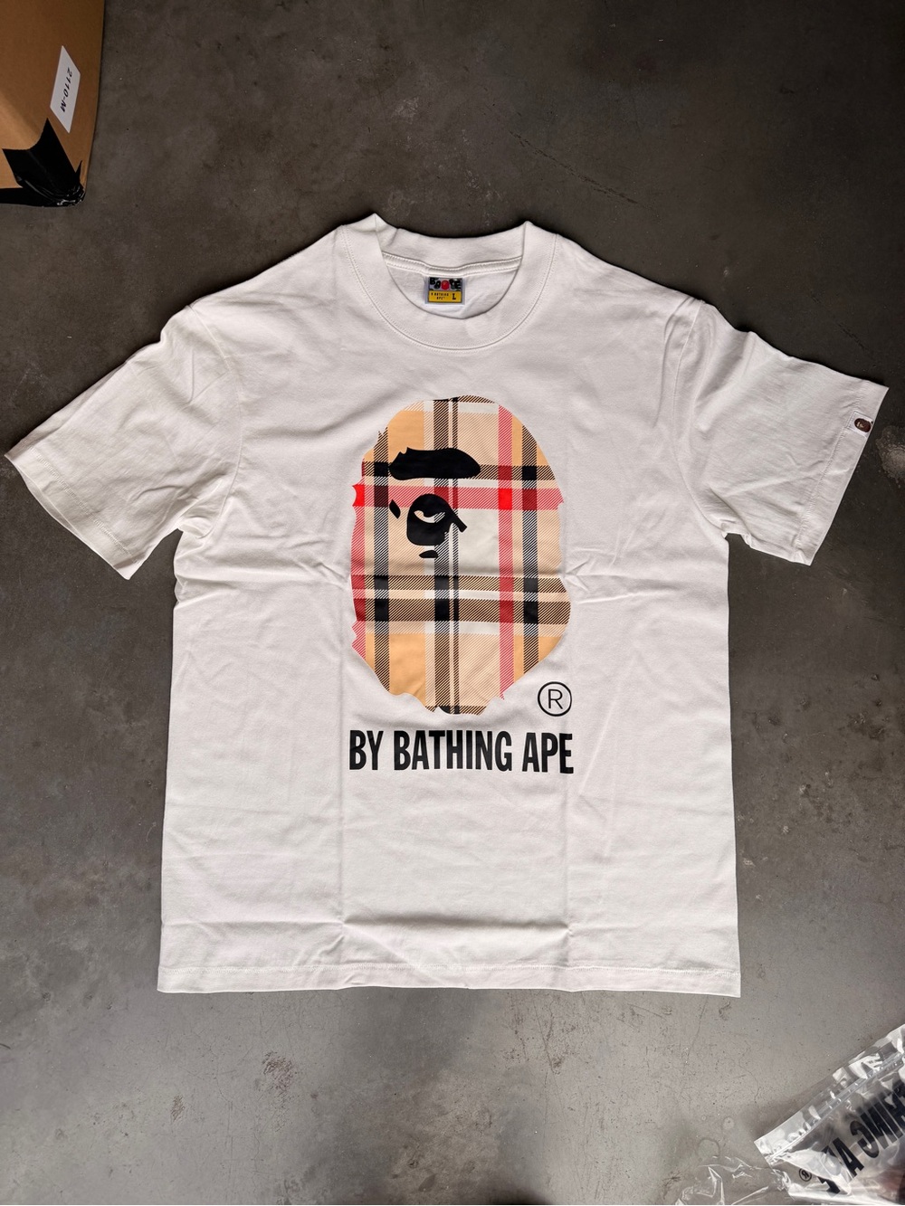 Bape White T‑Shirt with Beige Plaid Ape Head Graphic